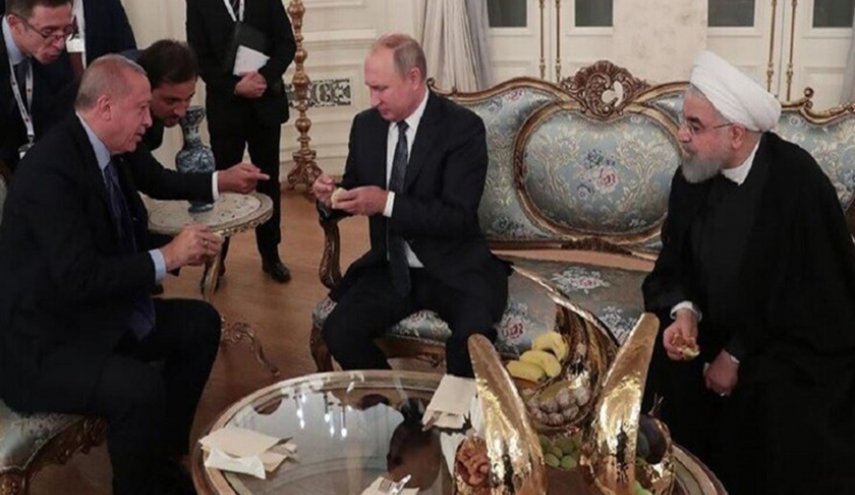 بالصور.. أردوغان يضيف بوتين وروحاني التين التركي في أنقرة