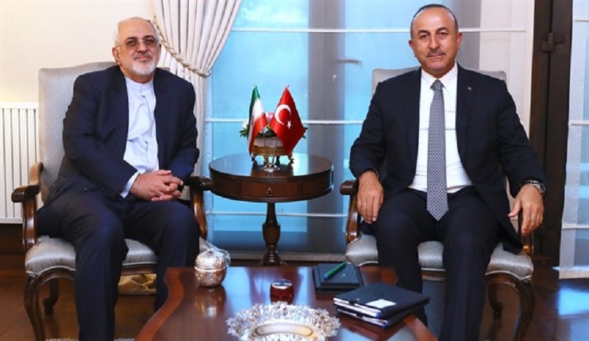 ظريف يبحث مع نظيره الترکي مستجدات المنطقة والشأن السوري