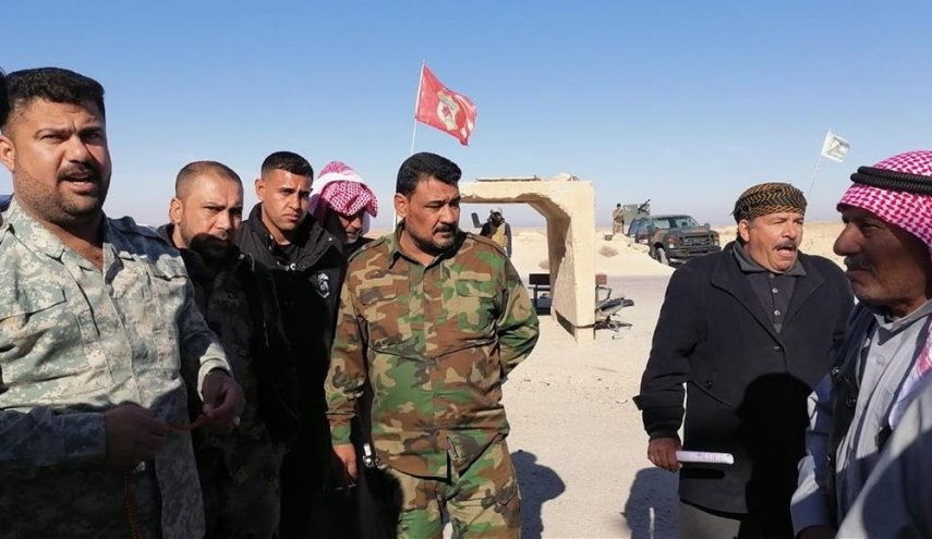 بالصور...الحشد الشعبي يؤمن عودة المزارعين غربي الانبار