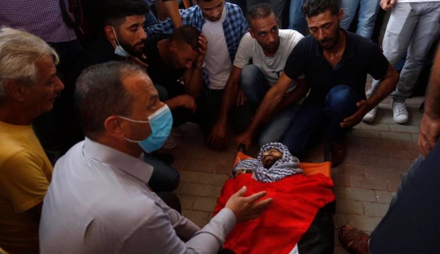 هنية وعباس يعزيان في الشهيد أبو يعقوب
