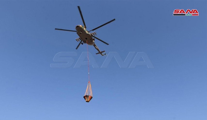 استمرار جهود تطويق حرائق حماه وطرطوس