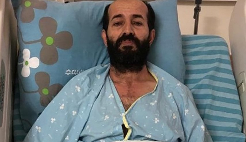 زوجة الأسير الأخرس: أنقذوا حياته قبل فوات الأوان