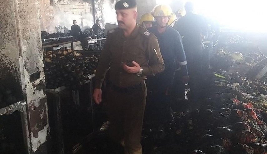 السيطرة على حريق سوق المحمودية في بغداد
