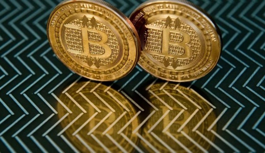 البيتكوين يسجل رقما قياسيا جديدا ويصل ل60 الف دولار