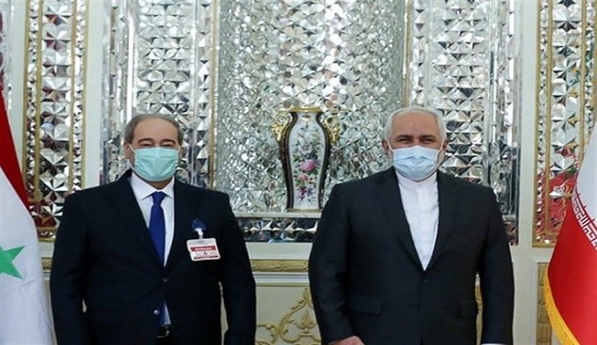 المقداد يدعو نظيره الايراني لزيارة سوريا