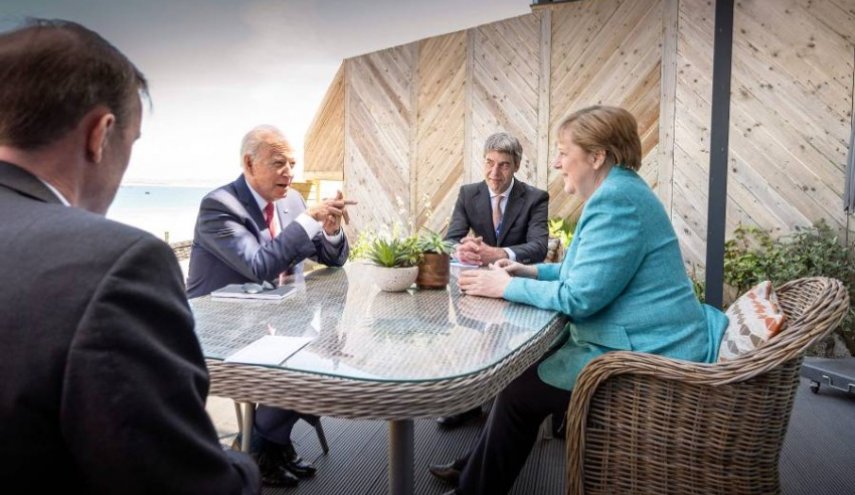 أول لقاء فعلي بين 'ميركل وبايدن' على هامش قمة G7
