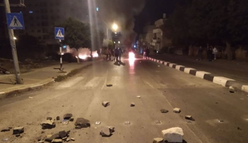 شهيد وإصابات خلال اقتحام الإحتلال نابلس ومداهمات في جنين 