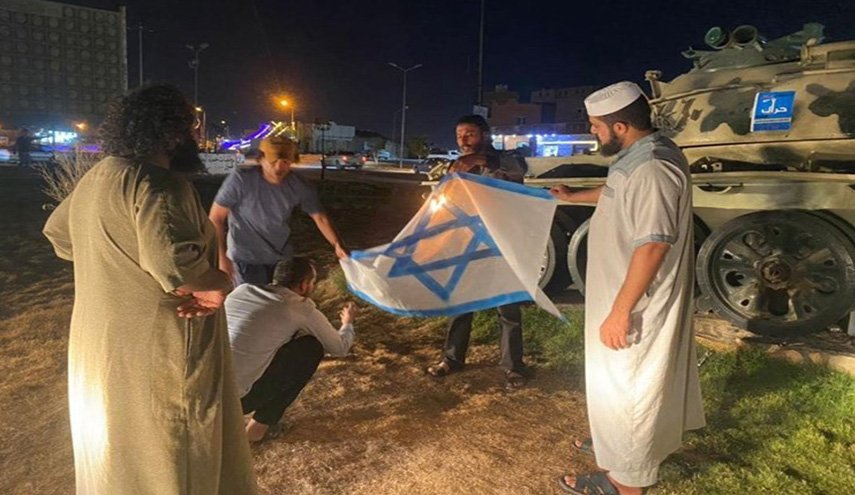 ليبيا.. تنديد سياسي وإحراق للعلم 