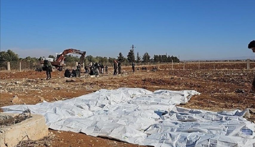 العثور على مقبرة جماعية تضم رفات 55 ضحية في ريف حلب