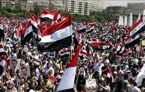 مردم شهر حلب در حمايت از اسد راهپيمايي كردند
