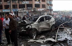 عشرات القتلى والجرحى بتفجير سيارة مفخخة بريف حمص
