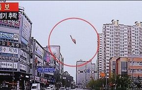 شاهد...مروحية تسقط في شارع بمدينة كورية جنوبية