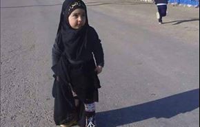 أطفال يشاركون في المسيرة الأربعينية