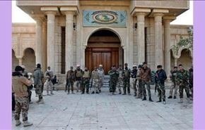 القوات العراقية تدخل الرمادي على اشلاء جثث الدواعش +فيديو