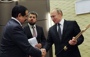 حمد يسلم فلاديمير مفتاح دمشق!