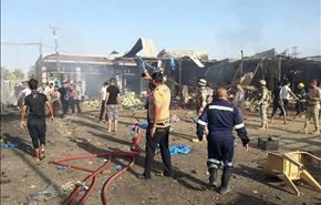 9 شهداء و20 جريحا بتفجير شمالي بغداد +صور