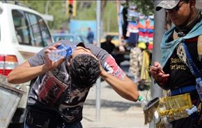 بالصور.. شاهد كيف استقبل العراقيون موجة الحر الشديدة!