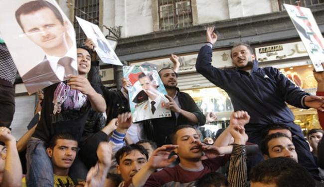 الصين تدعو العالم إلى عدم التدخل في سوريا