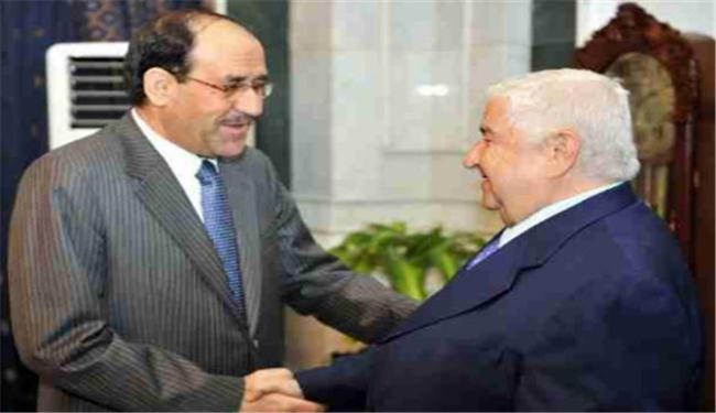 المعلم يلتقي المالكي في بغداد
