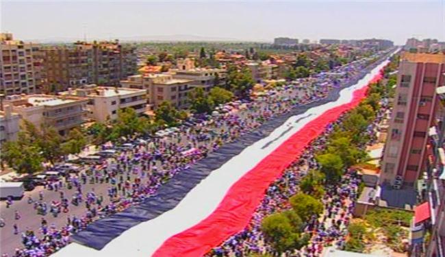 مسيرات حاشدة في دمشق تأييدا للوحدة الوطنية