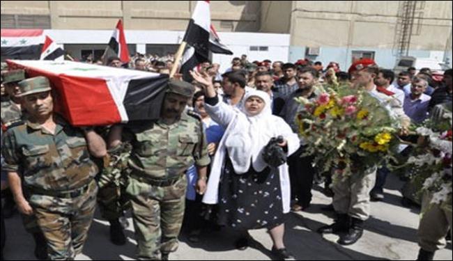 عرض اعترافات مسلحين وتشييع جثامين عسكريين بسوريا