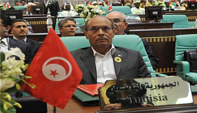 لقاء بين الرئيسين الايراني والتونسي على هامش القمة الاسلامية