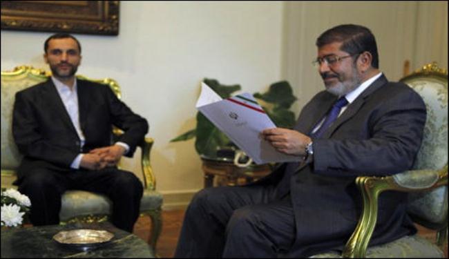 مرسي في بكين وطهران