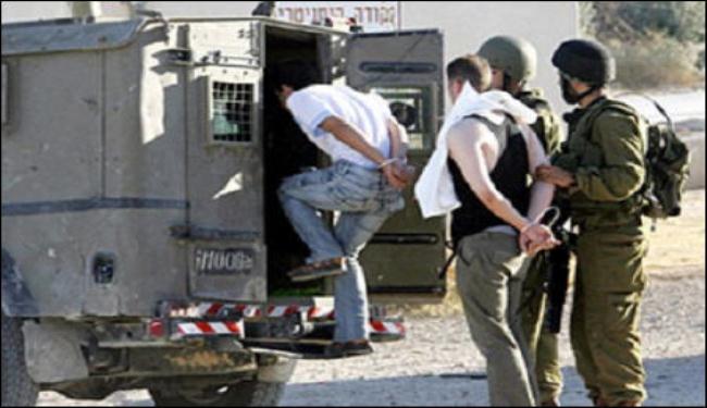 استشهاد فلسطيني بتل أبيب واعتقال 13 بالضفة الغربية