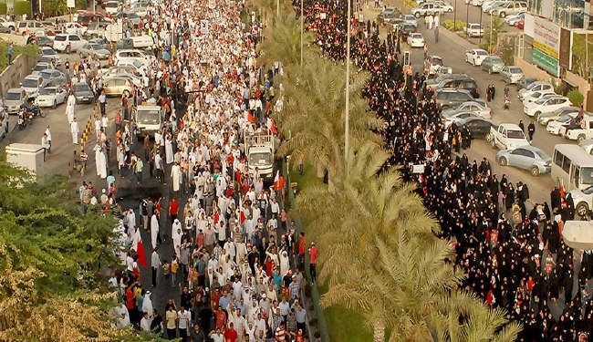 تظاهرات بالمنامة تطالب بالديمقراطية وسيادة الشعب