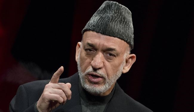 كرزاي يرى الأفغان يموتون في 'حرب ليست حربهم'