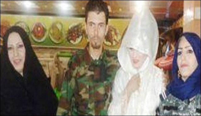 هذا الشاب العراقي مستعد للدفاع عن بلاده حتى في حفل زفافه