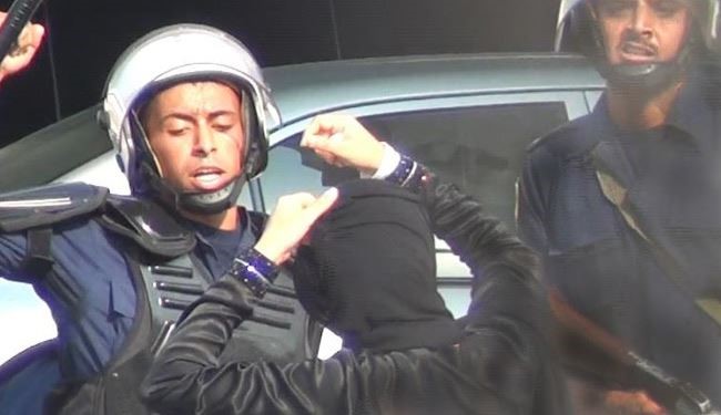 القوات البحرينية تعتدي على سيدّة بالضرب والشتم