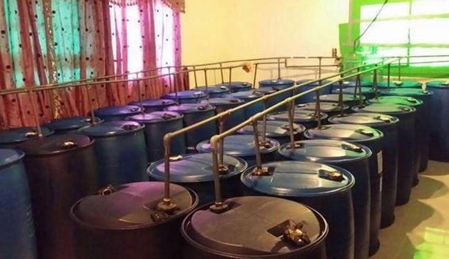 بالصور.. ضبط اضخم مصنع لإنتاج الخمور بالرياض