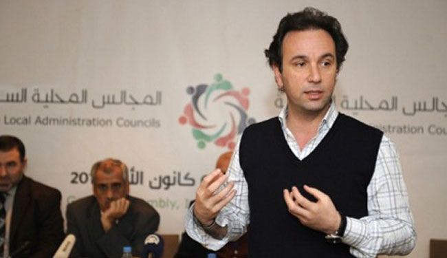 تعرّف على رئيس الائتلاف السوري الجديد