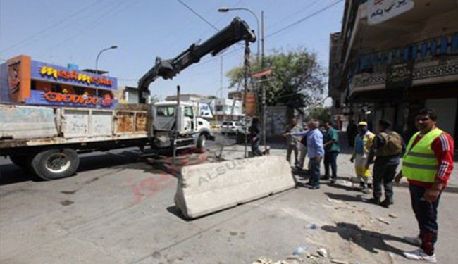بالصور.. شوارع الكرادة في بغداد تودع الحواجز الكونكريتية