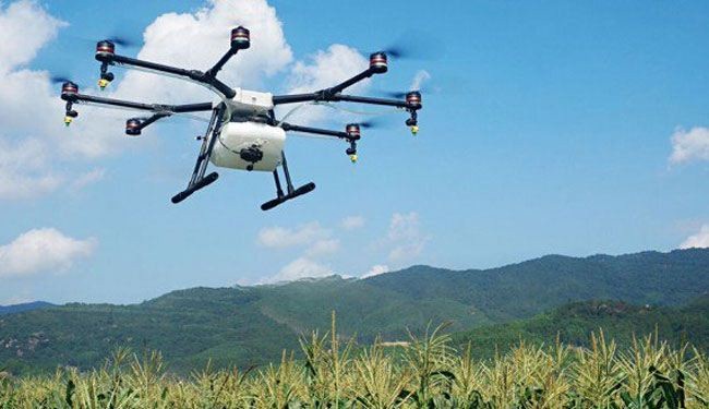 DJI تطرح طائرة بدون طيار لبخ المحاصيل الزراعية