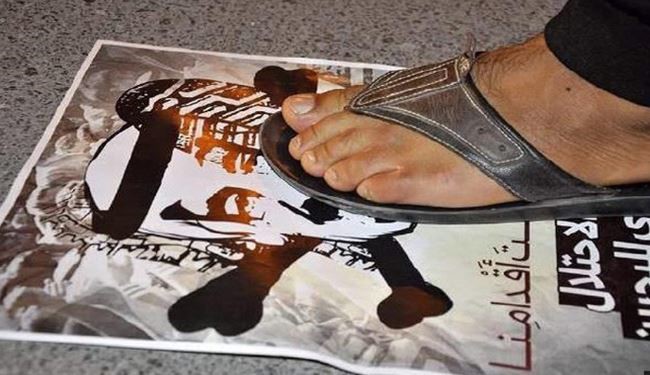 لگد کوب شدن عکس پادشاه عربستان در بحرین