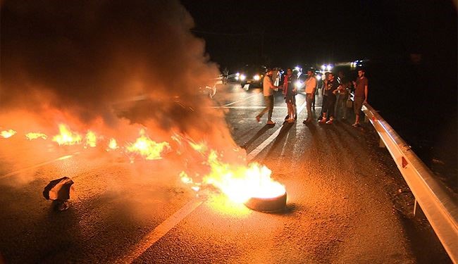 مواجهات بين الدرك وعاطلين عن العمل بذيبان الأردنية