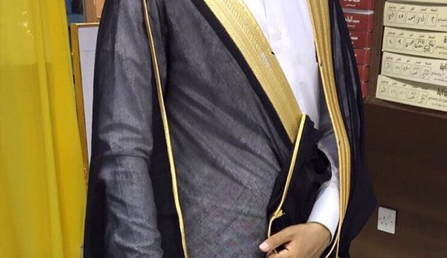 الزام مسؤولي السعودية ارتداء 
