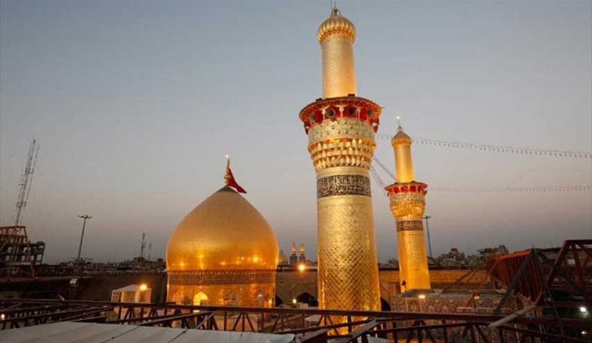 بالصور :رايات الحسين (ع) تزين شوارع بغداد في شهر الحزن