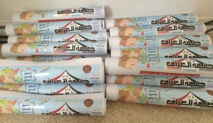 فرو ریختن هزاران مجله و روزنامه برای اهالی موصل +عکس