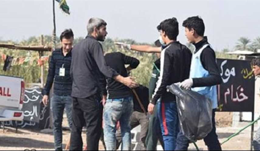 شاهد بالصور : تنظيف الشباب لطريق الزائرين بين بابل وكربلاء المقدسة..