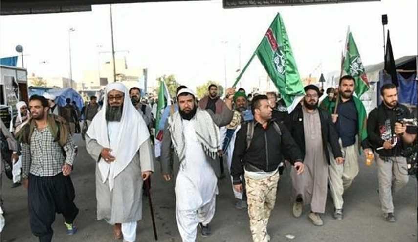 السنة والشيعة جنبا الى جنب مشیا الى كربلاء...