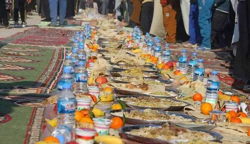 بالصور ...خدمة إطعام زوار الإمام الحسين (ع)