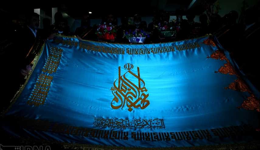 رفع الراية لمسجد الجمكران فوق اعالى برج ميلاد