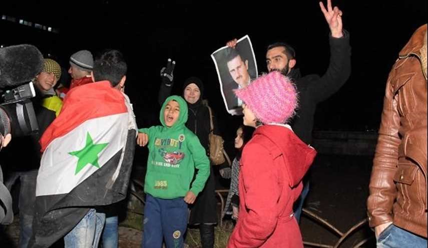 الفرحة تعم شوارع حلب بعد تحريرها من الارهاب