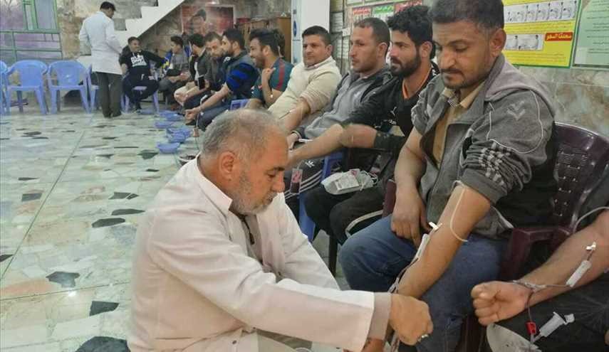 بالصور ..حملة تبرع بالدم لدعم القوات الأمنية والحشد الشعبي العراقي في بغداد