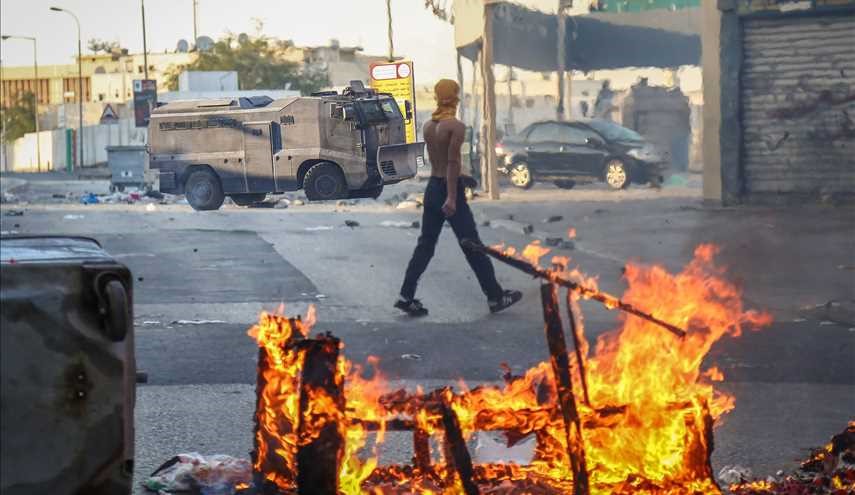 بالصور..احتجاجات حاشدة واشتباكات عنيفة في بلدة 