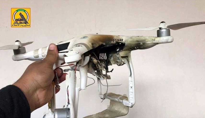 صورة : الحشد الشعبی يسقط طائرة مسيرة لـ داعش في تلعفر