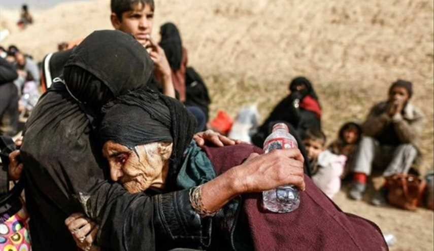 صور لنازحي مدينة الموصل العراقية وهم يفرون من بطش عصابات